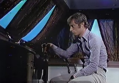 Ted steering the Lucky J